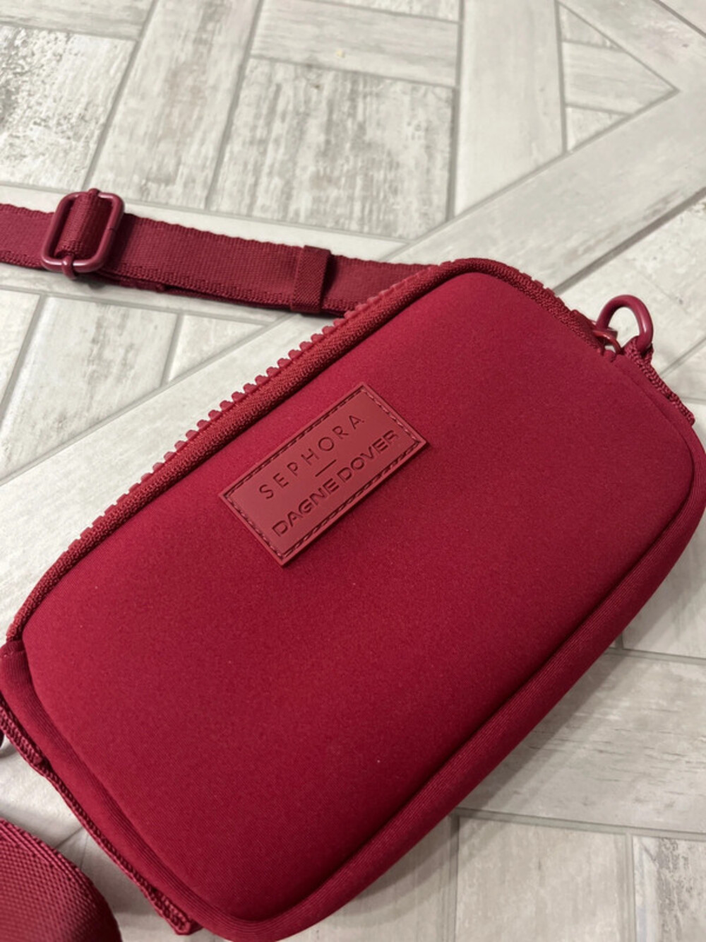 Dagne Dover Sephora colab bag. Burgundy crossbody with long strap brand new cond